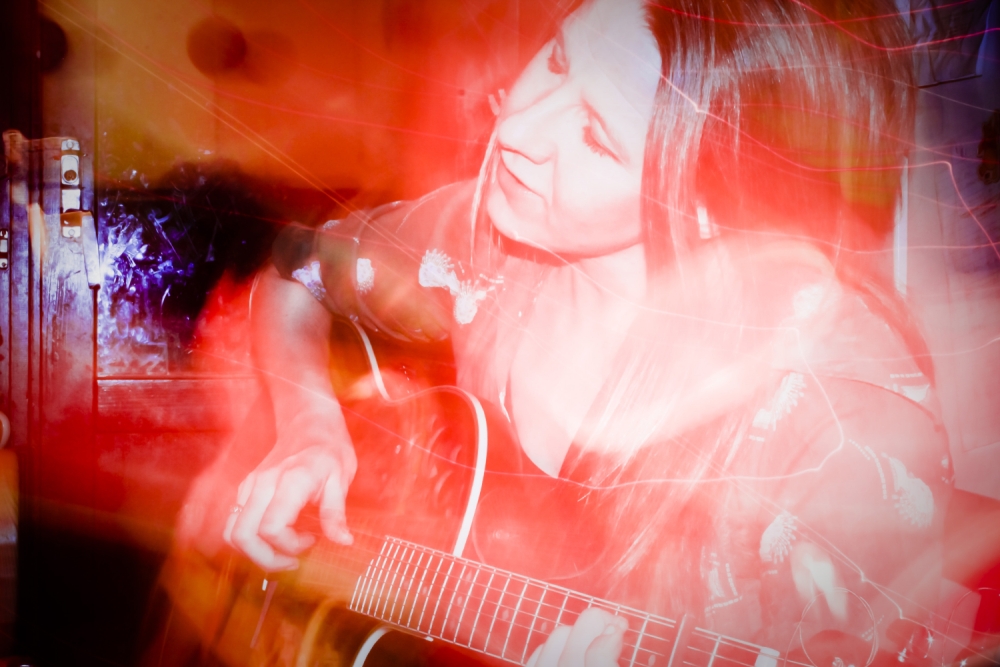 Sofia plays the guitar